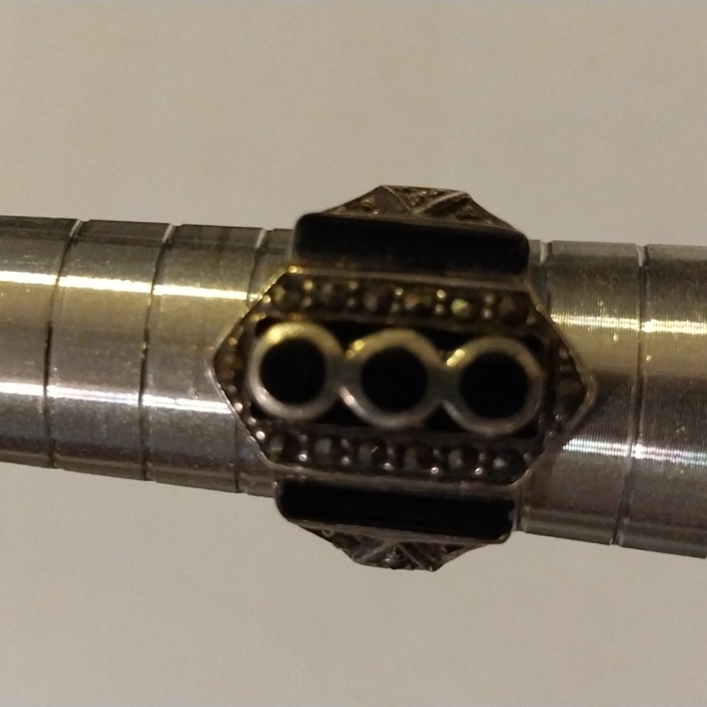 Sterling silver ring set with marcasites and onyx